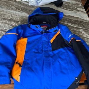 Karbon kids ski jacket, size 14, blue, black and orange.
